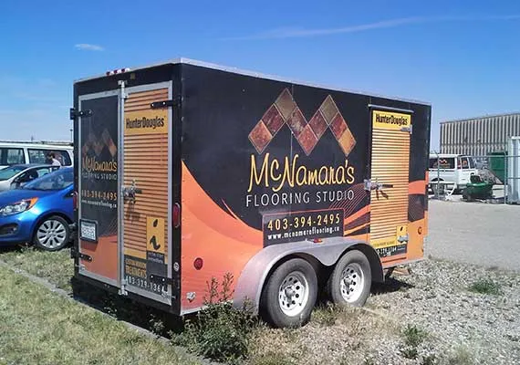 Fully wrapped enclosed trailer with printed graphics